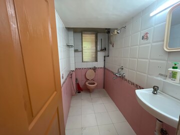 Bathroom in 1 BHK Apartment at Seven Bungalow, Andheri West – for Rent