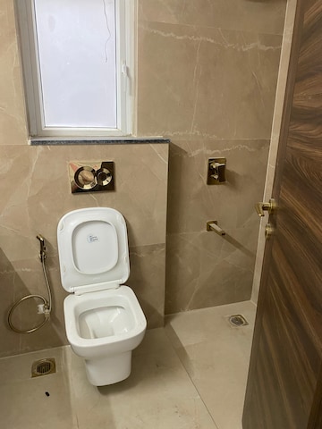 Bathroom in 3 BHK Builder Floor at Smart World Orchard, Sector 61 – for Rent