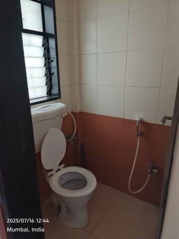 Bathroom in 1 BHK Apartment at Dheeraj Uphar CHS. LTD., Malad East – for Sale