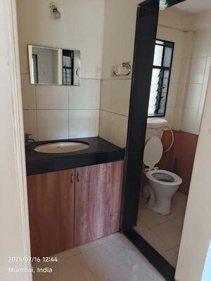 Kitchen in 1 BHK Apartment at Dheeraj Uphar CHS. LTD., Malad East – for Sale