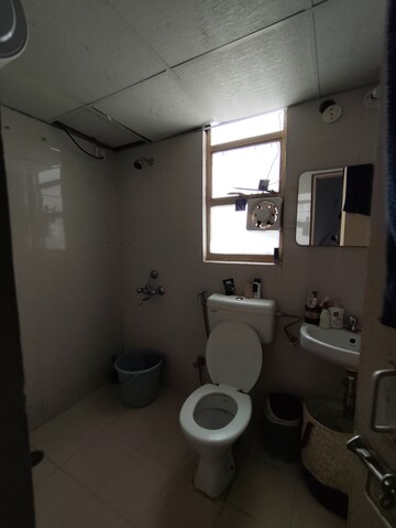 Bathroom in 2 BHK Apartment at Mahindra Aura, Sector 110a – for Rent