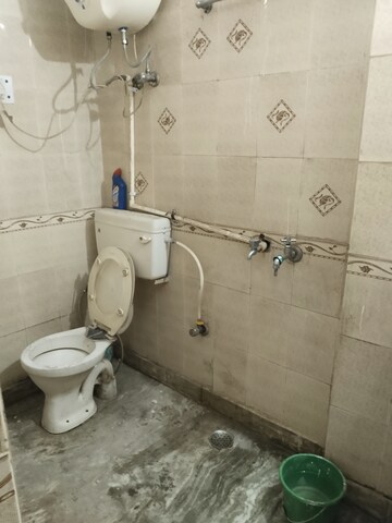 Bathroom in 3 BHK Builder Floor at Esteem Complex, Savitri Nagar – for Rent