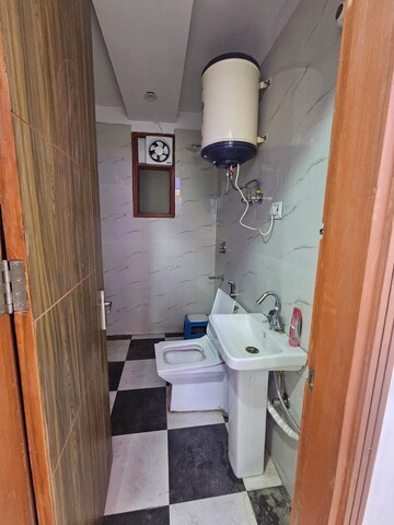Bathroom in 3 BHK Builder Floor at Palm Residency Chhatarpur, Chattarpur – for Rent