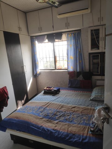 Bedroom in 3 BHK Apartment at Ranade Yashodhan, Mayur Colony – for Rent