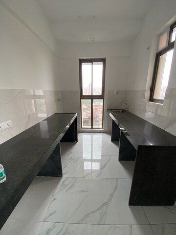 Kitchen in 2 BHK Apartment at Raymond Ten X Habitat, Pokhran Road No Two – for Rent