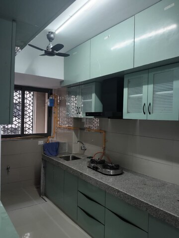 Kitchen in 2 BHK Apartment at Shilp Ananta, Shela – for Rent