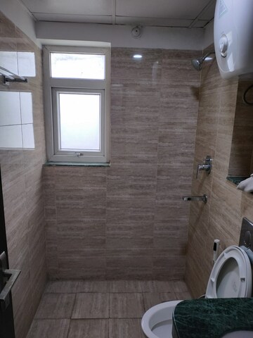 Bathroom in 3 BHK Apartment at BPTP Discovery Park, Sector 80 – for Rent