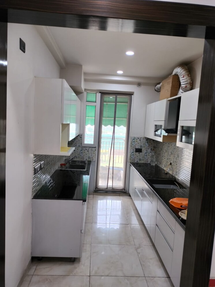 Kitchen, bptp-discovery-park 3 Bedroom 1625 Sq.Ft. Apartment In Sector 80 Faridabad 9037411