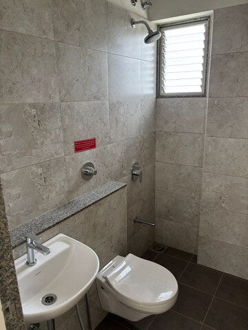 Bathroom in 3 BHK Apartment at Goyal Orchid Valley, Shela – for Rent