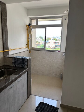 Kitchen in 3 BHK Apartment at Goyal Orchid Valley, Shela – for Rent