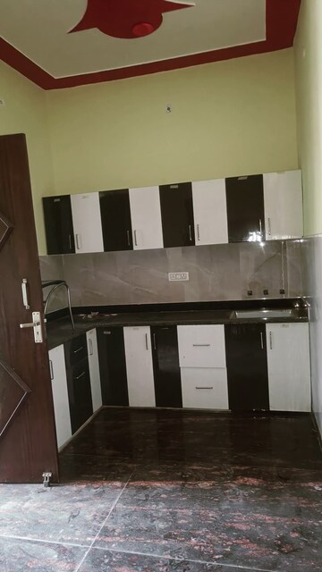 Kitchen in 1.5 BHK Penthouse at Modipuram – for Sale