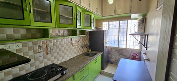 Kitchen in 2 BHK Apartment at Sunrise Afshan Apartments, Benson Town – for Rent