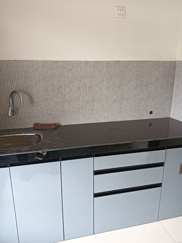 Kitchen in 2 BHK Apartment at Ashapura Asha Icon, Dombivli East – for Rent
