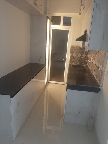 Kitchen in 1 BHK Apartment at Signature Global Golf Greens, Sector 79 – for Rent