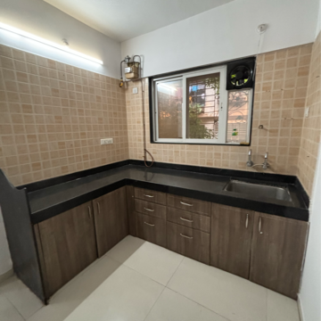 Kitchen in 1 BHK Apartment at GK Royale Rahadki Greens, Rahatani – for Rent
