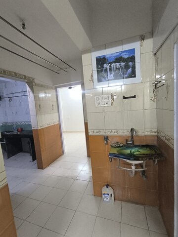 Kitchen in 1.5 BHK Apartment at Sri Ram Park CHS, Kharghar – for Sale