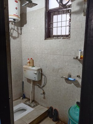 Bathroom in 2 BHK Apartment at Rattan Apartment, Khanpur – for Sale