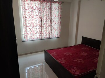 Bedroom in 2 BHK Apartment at Ganga Arcadia, Kharadi – for Rent