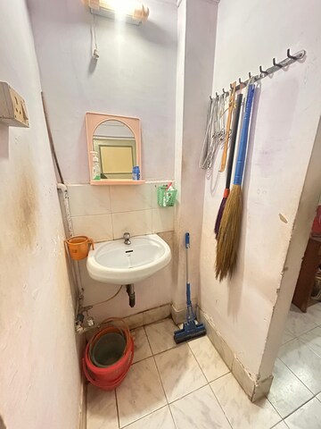 Bathroom in 1 BHK Apartment at Sunrise CHS Mhada, Goregaon East – for Rent