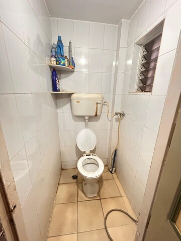 Bathroom in 1 BHK Apartment at Sunrise CHS Mhada, Goregaon East – for Rent
