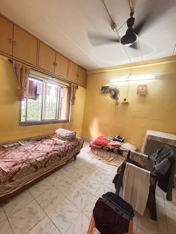 Bedroom in 1 BHK Apartment at Sunrise CHS Mhada, Goregaon East – for Rent