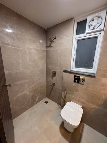 Bathroom in 2 BHK Apartment at Smart World Orchard, Sector 61 – for Sale