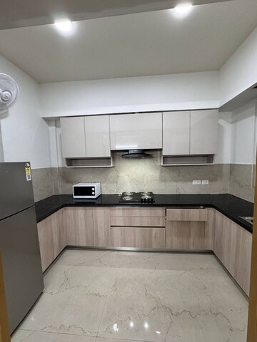 Kitchen in 2 BHK Apartment at Smart World Orchard, Sector 61 – for Sale