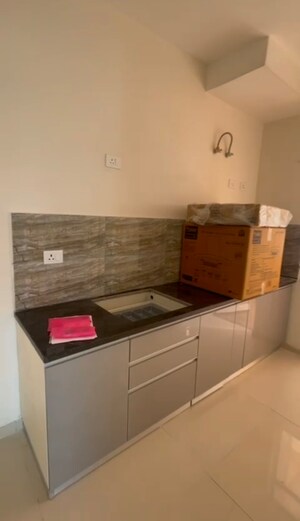 Kitchen in 2 BHK Apartment at Shapoorji Pallonji Joyville Phase 2, Sector 102 – for Sale