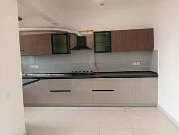 Kitchen in 2 BHK Apartment at Brigade Cornerstone Utopia Serene, Varthur – for Rent