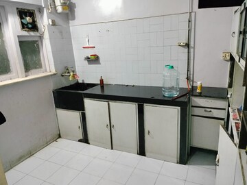 Kitchen in 2 BHK Apartment at Vijaynagar Society, Marol – for Rent