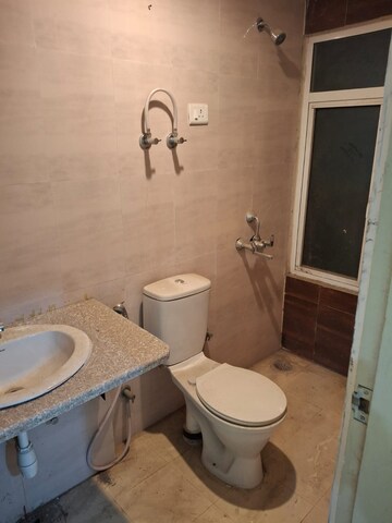 Bathroom in 2 BHK Apartment at Mahagun Mantra II, Sector 10 Greater Noida – for Rent