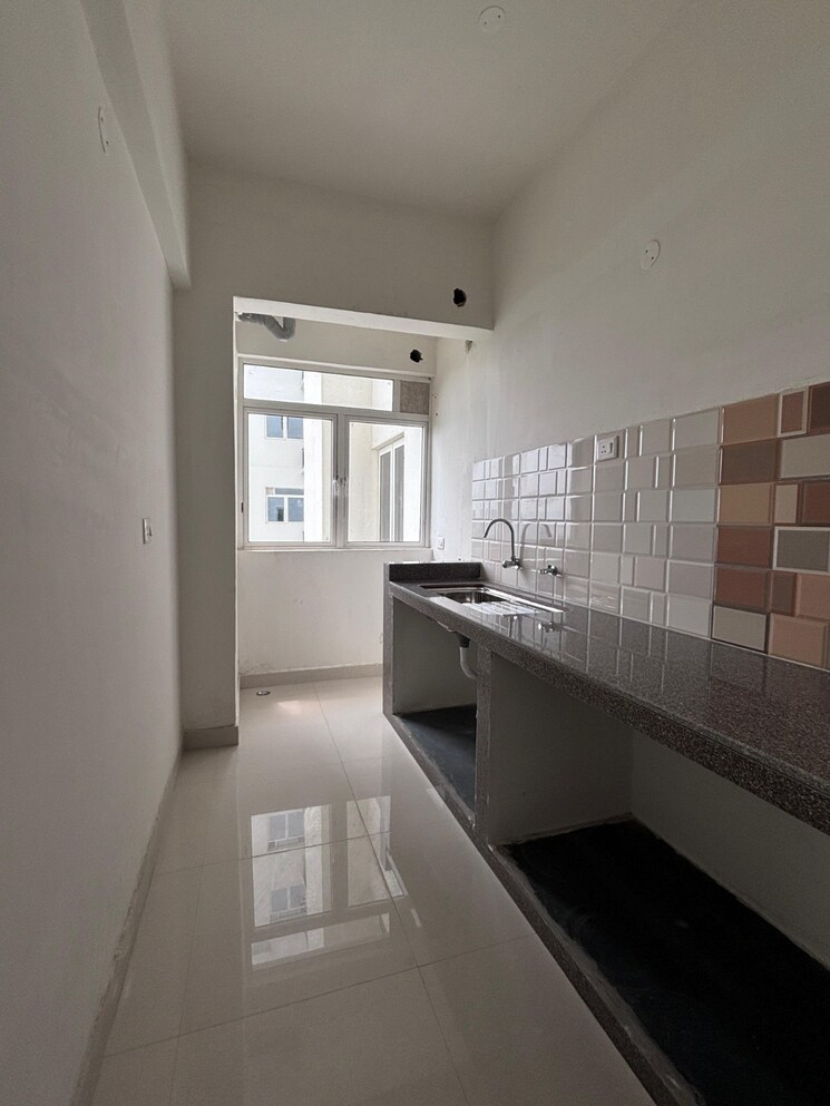 Kitchen, rishi-pranaya-phase-i 3 Bedroom 1185 Sq.Ft. Apartment In Rajarhat New Town Kolkata 9038258