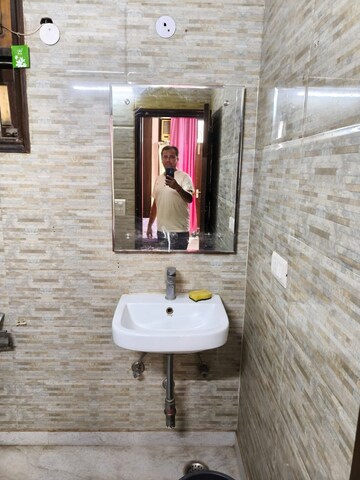 Bathroom in 2 BHK Apartment at Ajnara Homes, Sector 16b Greater Noida – for Rent