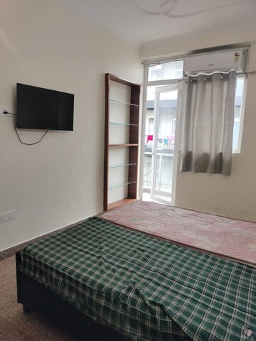 Bedroom in 1 BHK Builder Floor at Sushant Lok I – for Rent
