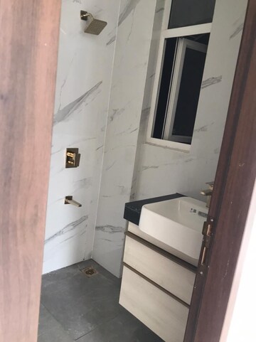 Bathroom in 3 BHK Apartment at Smart World Orchard, Sector 61 – for Rent
