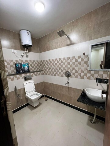 Bathroom in 3 BHK Builder Floor at Ansal API Esencia, Sector 67 – for Rent