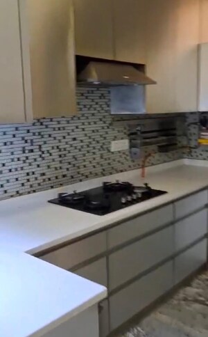 Kitchen in 3 BHK Apartment at Mahagun Moderne, Sector 78 – for Sale