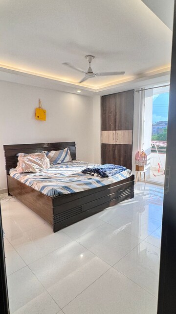 Bedroom in 3 BHK Builder Floor at Ansal API Esencia, Sector 67 – for Rent