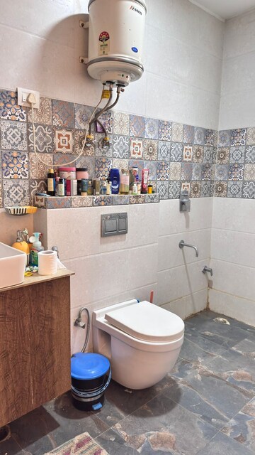 Bathroom in 3 BHK Builder Floor at Ansal API Esencia, Sector 67 – for Rent