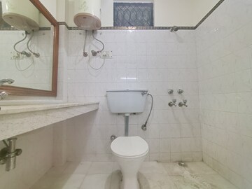 Bathroom in 2 BHK Apartment at Boutique Residential Apartments C-220, Malviya Nagar – for Rent