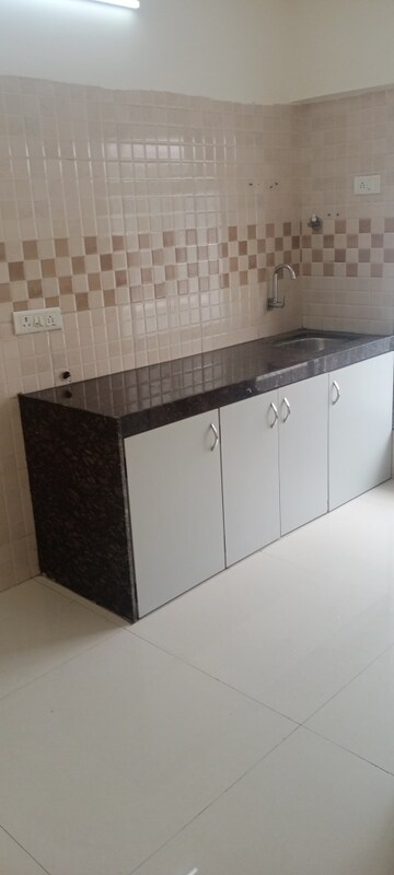 Kitchen in 1 BHK Apartment at Bindra Complex, Andheri East – for Rent