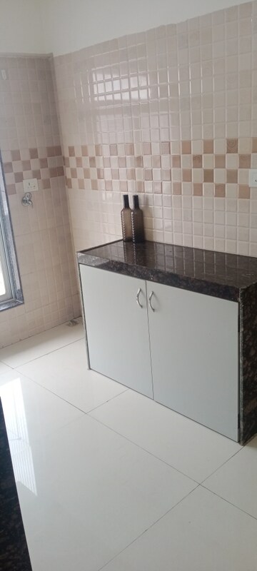 Kitchen in 1 BHK Apartment at Bindra Complex, Andheri East – for Rent