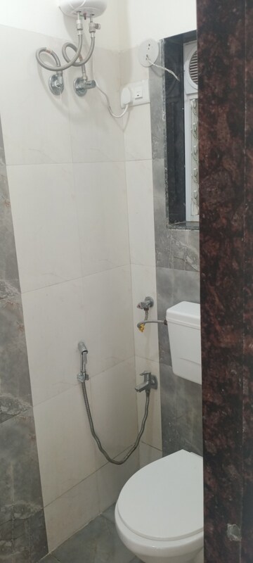 Bathroom in 1 BHK Apartment at Bindra Complex, Andheri East – for Rent