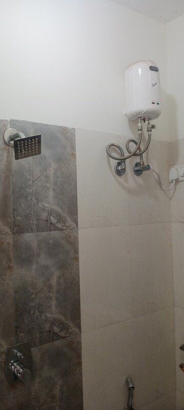 Bathroom in 1 BHK Apartment at Bindra Complex, Andheri East – for Rent