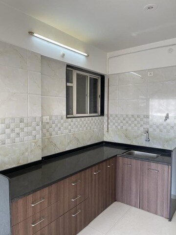 Kitchen in 2 BHK Apartment at Sukhwani Dynasty, Wakad – for Rent