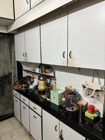 Kitchen in 2 BHK Apartment at Runwal Nirvana, Parel – for Rent