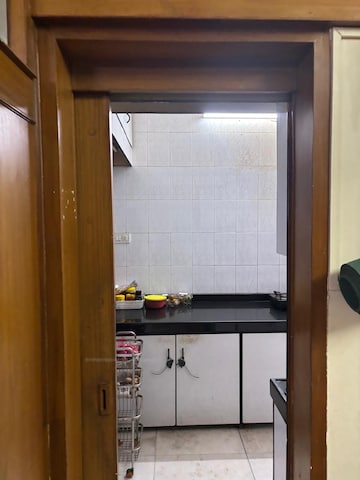 Kitchen in 2 BHK Apartment at Runwal Nirvana, Parel – for Rent