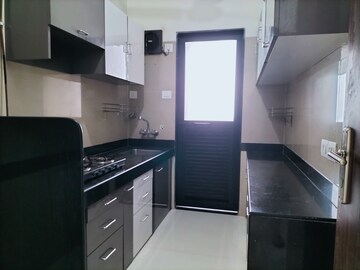 Kitchen in 2 BHK Apartment at K Raheja Raheja Residency, Malad East – for Rent