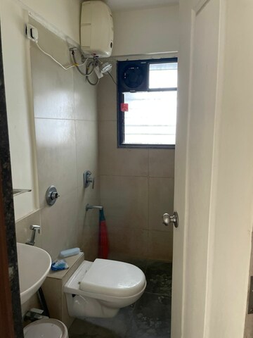 Bathroom in 2 BHK Apartment at Om Tropica, Ravet – for Rent