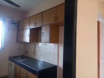 Kitchen in 1 BHK Apartment at Gundecha Valley of Flowers, Kandivali East – for Rent